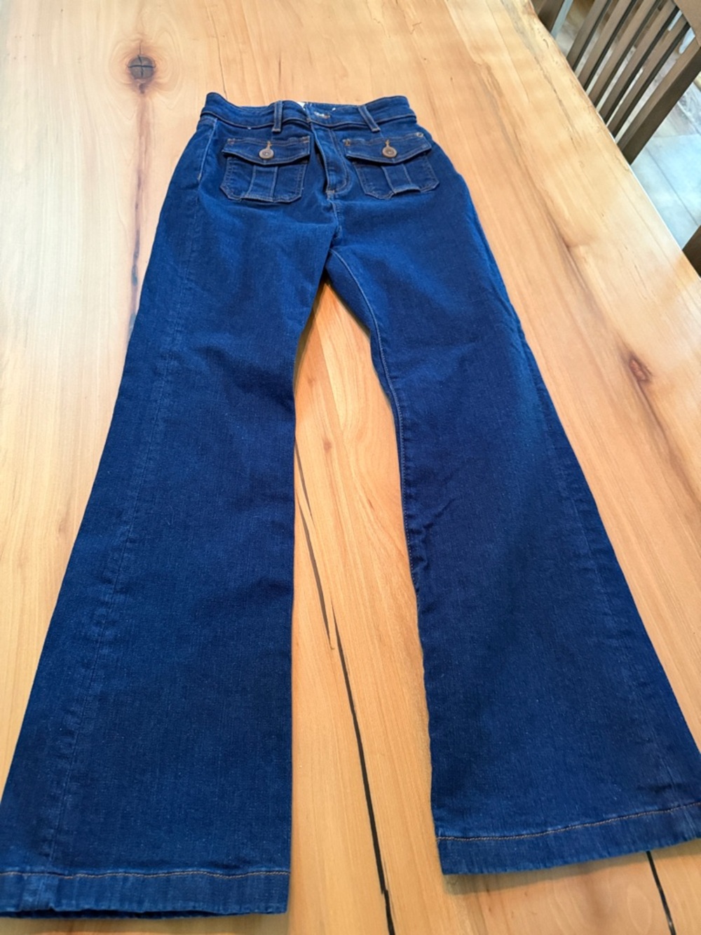 Women’s Dark Blue Flared Jeans with Back Pocket Detail
The Slim Flare.